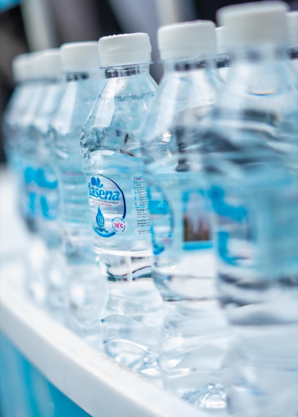 Rows of chilled Lasena bottles ready to serve